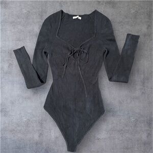 Abercrombie & Fitch Black Ribbed Super Soft Bodysuit. Never Worn. Size L